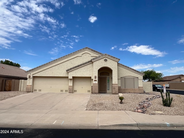 view of front of property featuring a garage