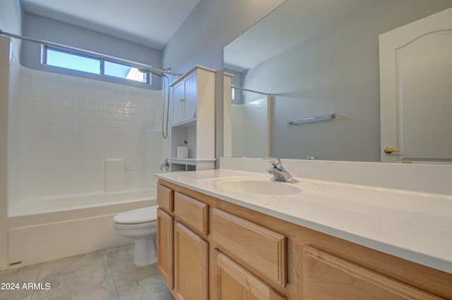 full bathroom with tile patterned floors, washtub / shower combination, vanity, and toilet