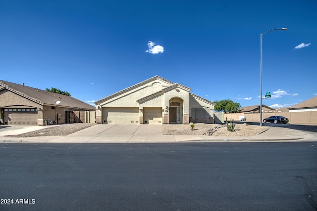 view of front of property with a garage