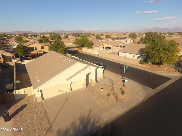 birds eye view of property featuring a mountain view