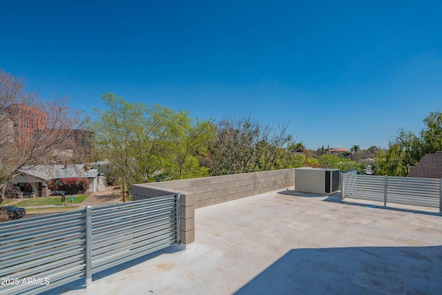 view of patio with fence