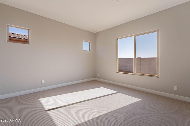 view of carpeted spare room