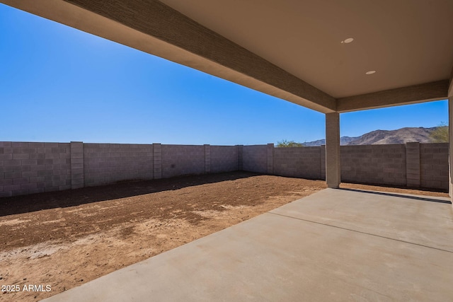 view of patio featuring a mountain view