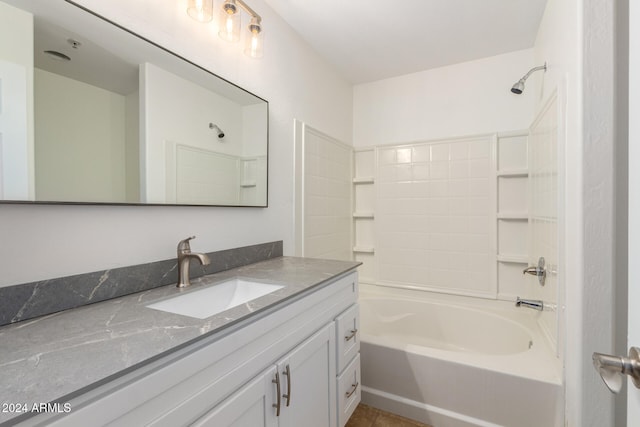 bathroom with shower / tub combination, tile patterned flooring, and vanity