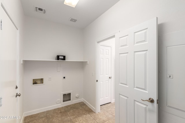 laundry room with washer hookup, electric dryer hookup, hookup for a gas dryer, and light tile patterned floors