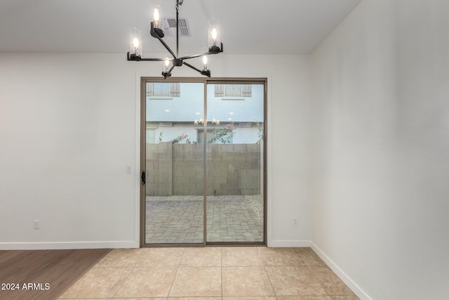 interior space featuring an inviting chandelier