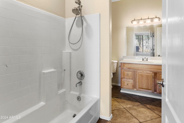 full bathroom with tub / shower combination, vanity, tile patterned flooring, and toilet