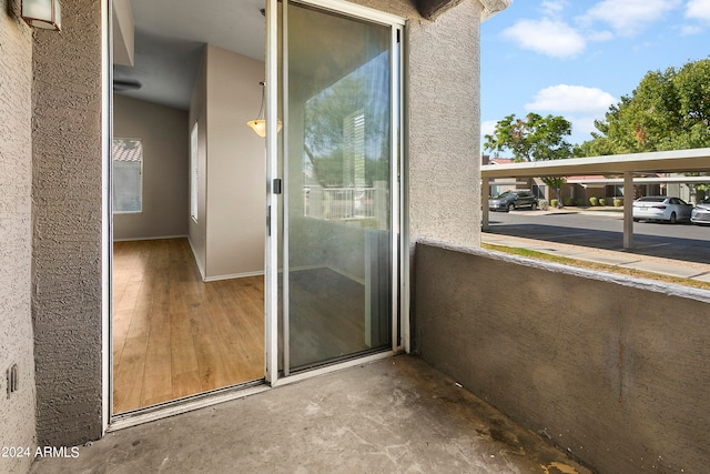 entrance to property featuring a balcony