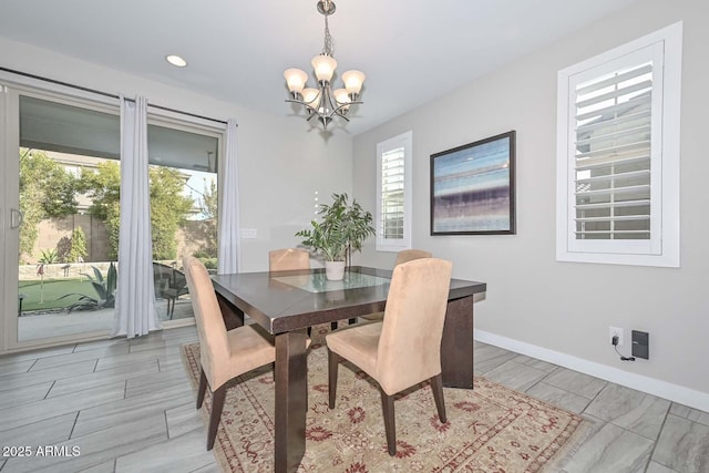 dining room featuring an inviting chandelier