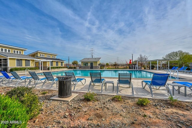 view of swimming pool featuring a patio