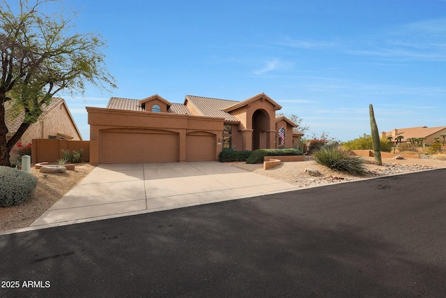 view of front of home with a garage