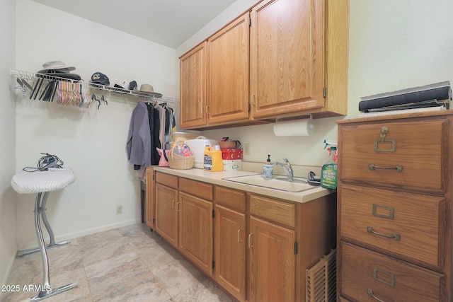 laundry area with sink