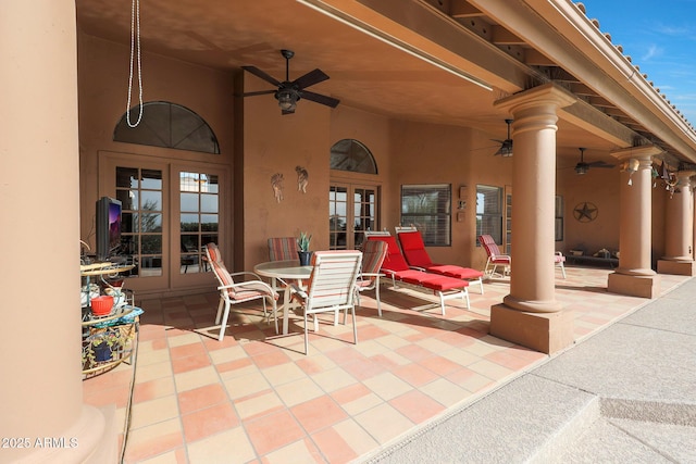 view of patio with ceiling fan and french doors