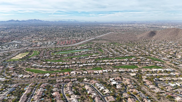 drone / aerial view featuring a mountain view