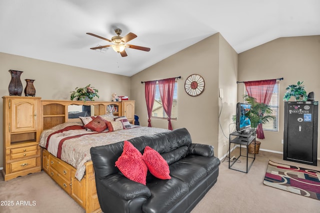 bedroom featuring multiple windows, light colored carpet, and vaulted ceiling