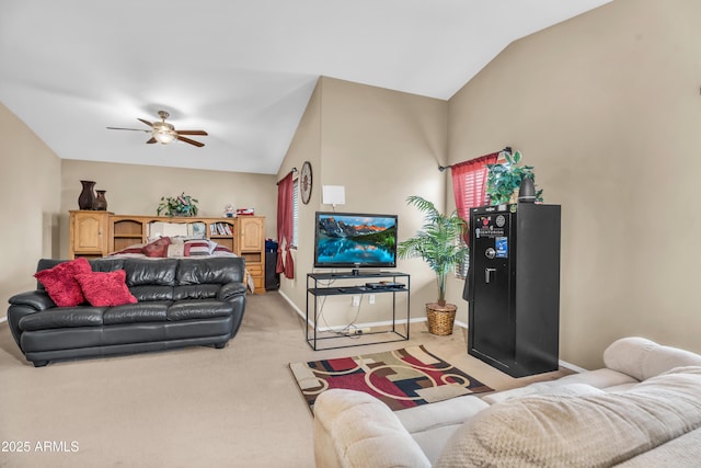 living room with light carpet, ceiling fan, baseboards, and lofted ceiling