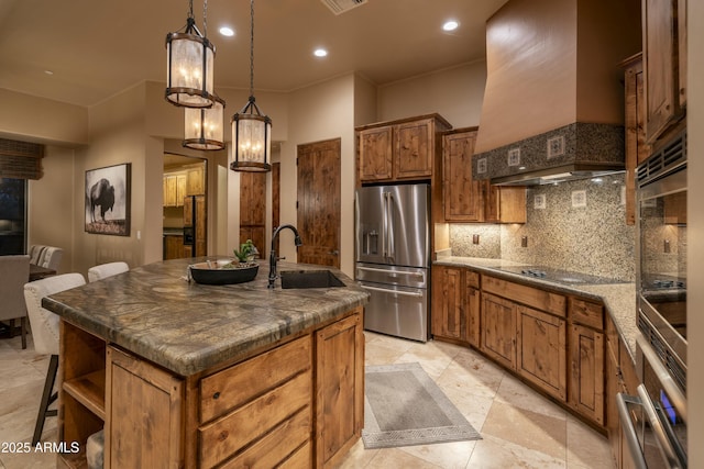25031 N Paso Trl, Scottsdale, AZ 85255 - kitchen featuring a sink, stainless steel fridge, premium range hood, brown cabinets, and decorative backsplash