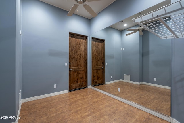 25031 N Paso Trl, Scottsdale, AZ 85255 - interior space featuring baseboards, visible vents, wood finished floors, and a ceiling fan