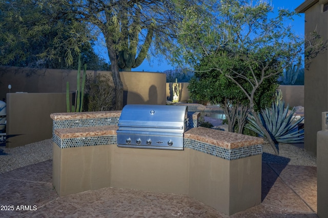 25031 N Paso Trl, Scottsdale, AZ 85255 - view of patio with area for grilling, a fenced backyard, and grilling area