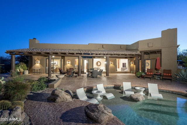 25031 N Paso Trl, Scottsdale, AZ 85255 - back of property with a chimney, a patio, stucco siding, and outdoor dining space