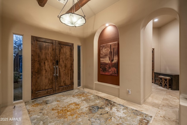 25031 N Paso Trl, Scottsdale, AZ 85255 - foyer entrance featuring baseboards, visible vents, and arched walkways
