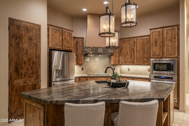 25031 N Paso Trl, Scottsdale, AZ 85255 - kitchen with dark countertops, appliances with stainless steel finishes, brown cabinetry, and decorative backsplash