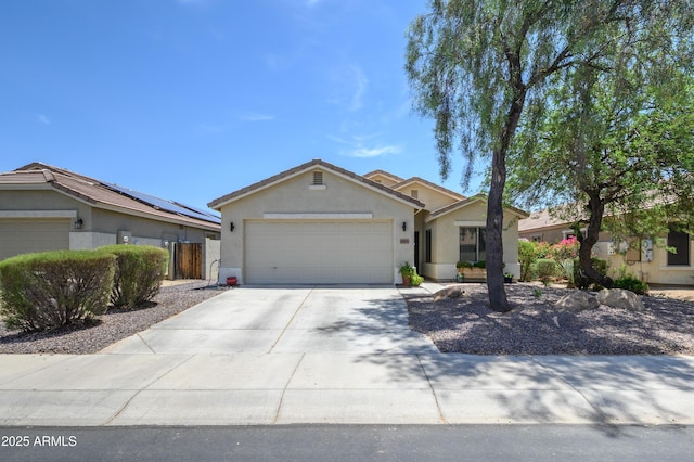 9115 N 183rd Ln, Waddell, AZ 85355 - single story home featuring a garage, stucco siding, and driveway