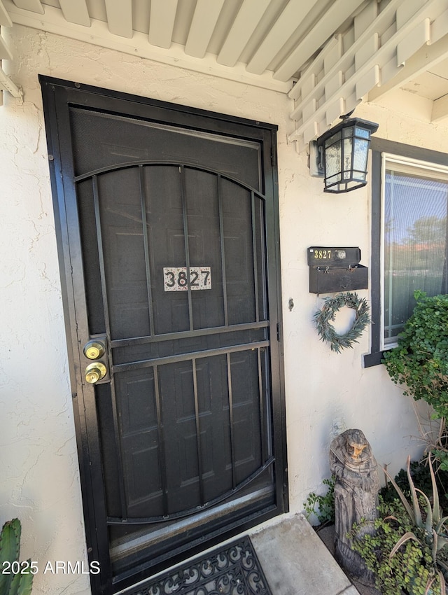 3827 N 8th St, Phoenix, AZ 85014 - property entrance with stucco siding