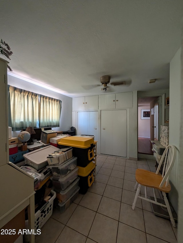 3827 N 8th St, Phoenix, AZ 85014 - living room with ceiling fan and light tile patterned flooring