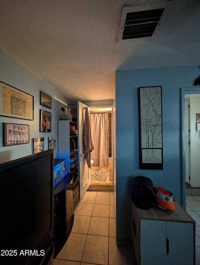 3827 N 8th St, Phoenix, AZ 85014 - hallway with light tile patterned floors