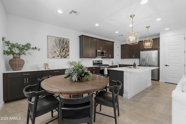 655 S Jacana Ln, Gilbert, AZ 85296 - dining space with a chandelier, recessed lighting, and baseboards
