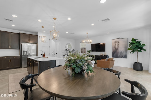 655 S Jacana Ln, Gilbert, AZ 85296 - dining area featuring recessed lighting, a chandelier, and light tile patterned floors