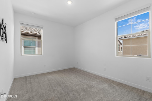655 S Jacana Ln, Gilbert, AZ 85296 - spare room featuring carpet flooring and baseboards