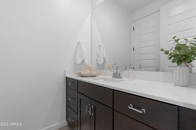 655 S Jacana Ln, Gilbert, AZ 85296 - bathroom with vanity and baseboards