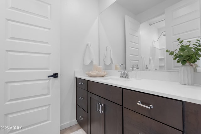 655 S Jacana Ln, Gilbert, AZ 85296 - bathroom with vanity and baseboards
