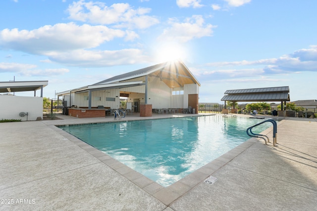 655 S Jacana Ln, Gilbert, AZ 85296 - community pool featuring a patio