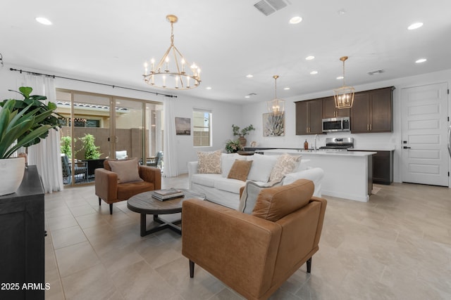 655 S Jacana Ln, Gilbert, AZ 85296 - living area featuring a chandelier, recessed lighting, and light tile patterned floors