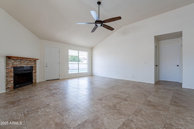 unfurnished living room featuring a stone fireplace, ceiling fan, and lofted ceiling