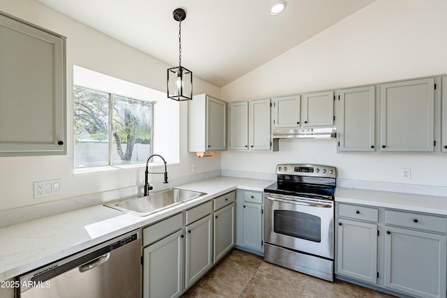 kitchen with stainless steel appliances, vaulted ceiling, sink, pendant lighting, and gray cabinets