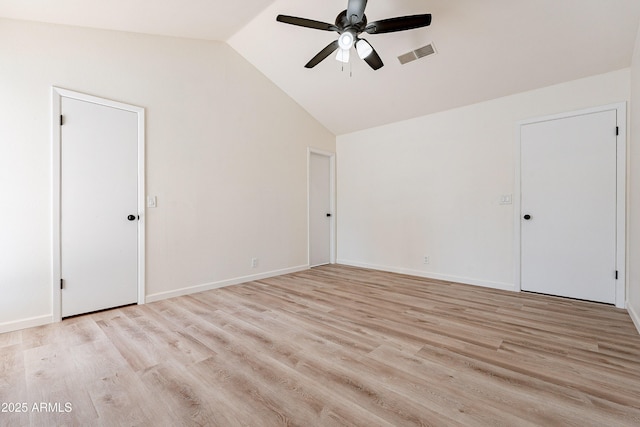 unfurnished room featuring ceiling fan, light hardwood / wood-style flooring, and vaulted ceiling