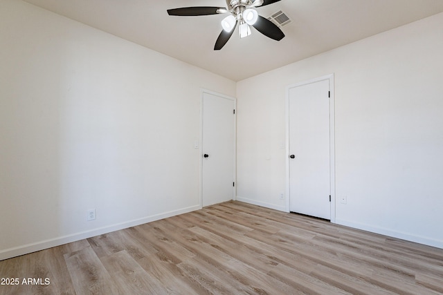 unfurnished bedroom featuring ceiling fan and light wood-type flooring