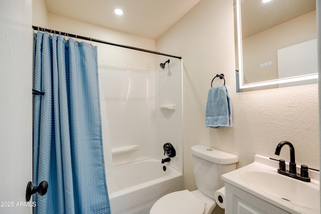 full bathroom with vanity, toilet, and shower / bath combo