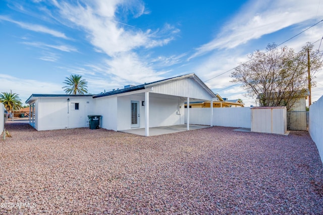 back of house featuring a patio area