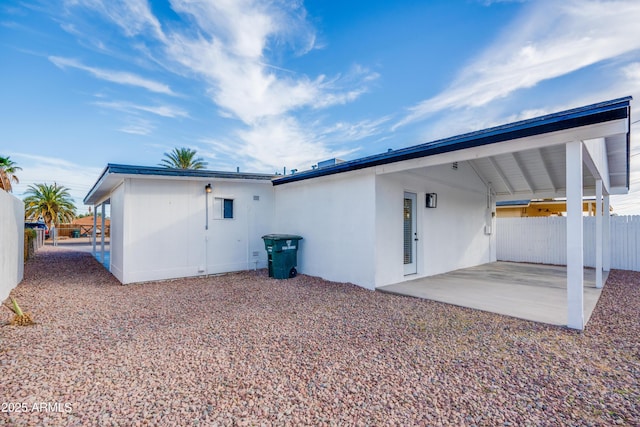 rear view of house featuring a patio