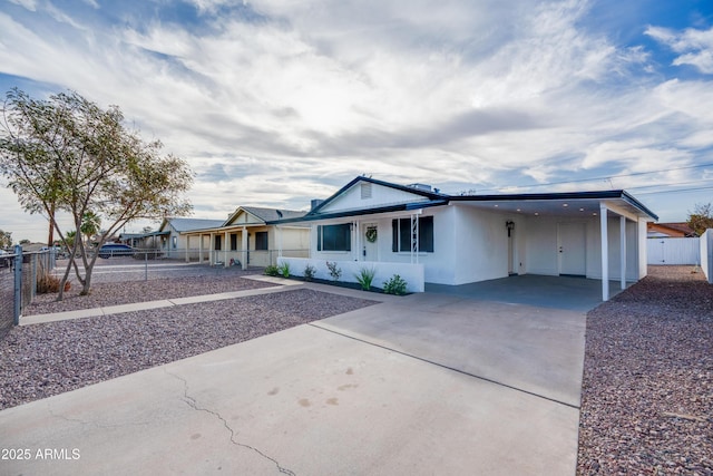 view of front facade with a carport