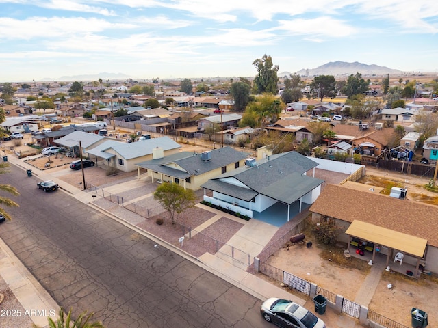 drone / aerial view featuring a mountain view