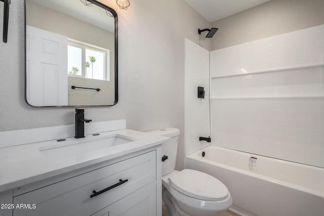 full bathroom with vanity, shower / bathtub combination, and toilet