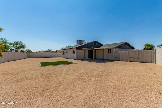 back of property with central air condition unit