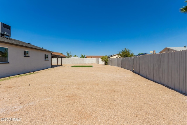 view of yard featuring central AC unit