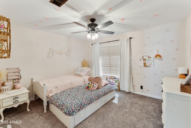 bedroom featuring baseboards, light carpet, visible vents, and a ceiling fan